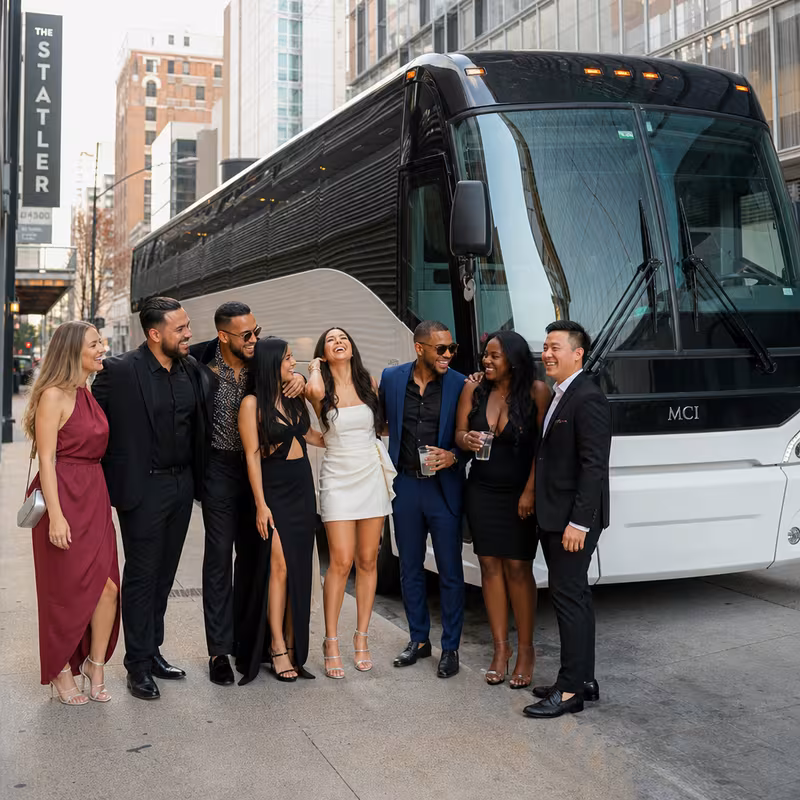Passengers loading luggage while boarding an Dallas group shuttle