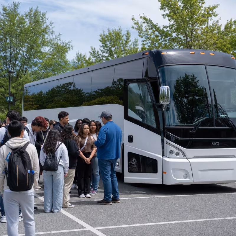 Black Mercedes Sprinter van staged for an Dallas School Transportation group