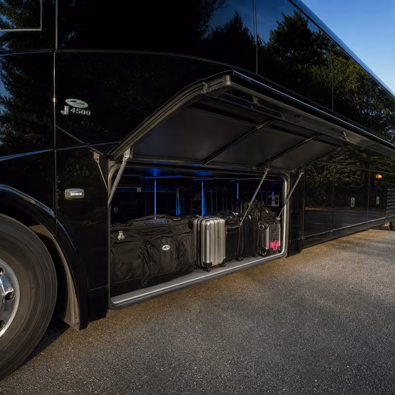 Party bus interior with wraparound leather seating and LED lighting in Dallas