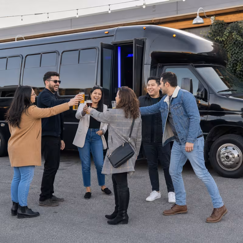 Passengers loading luggage while boarding an Dallas group shuttle